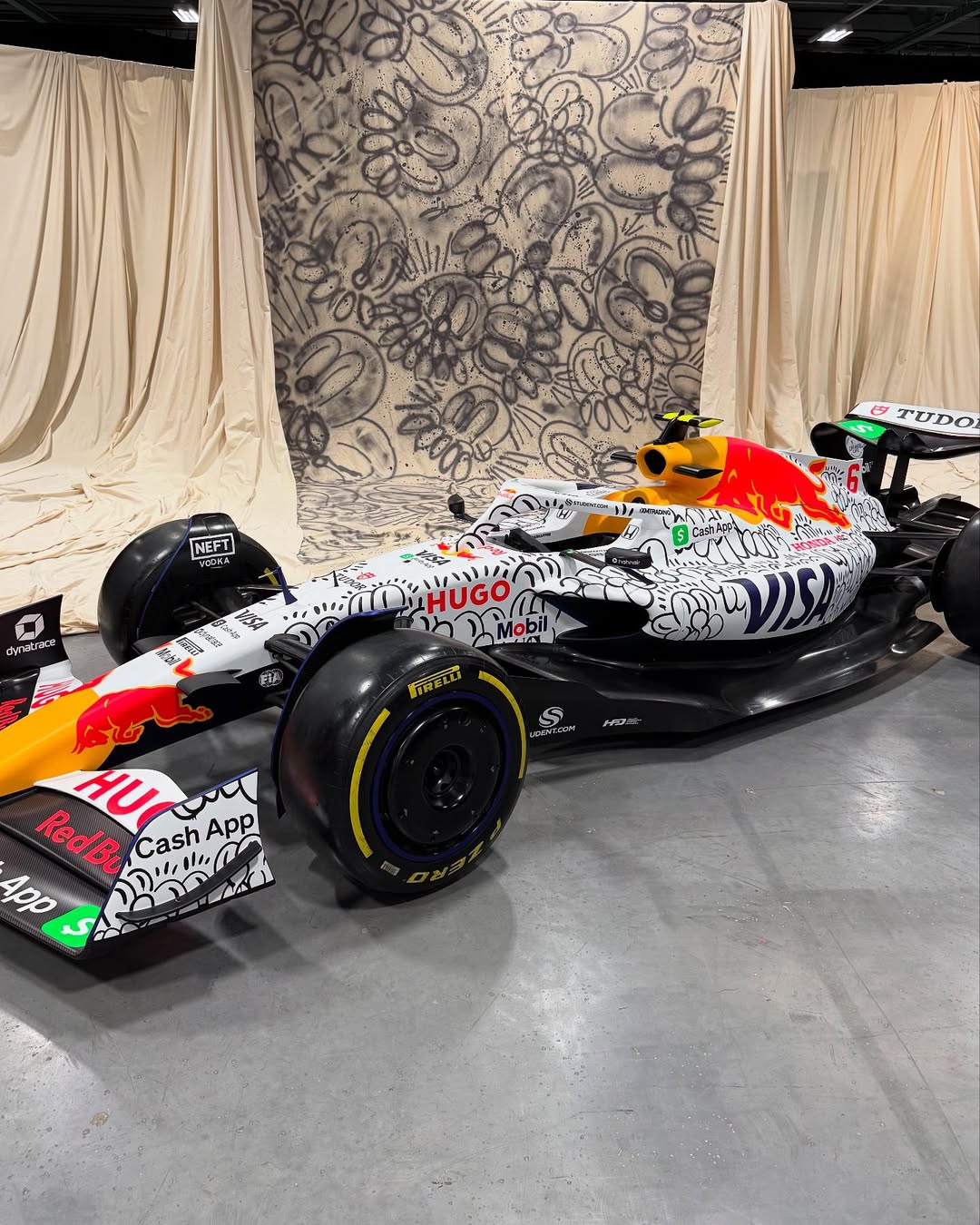 Olaolu Slawn Becomes World's First Artist to Paint a Racing F1 Car
